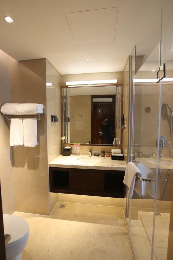 Hotel Ramada Jinan Esterno foto